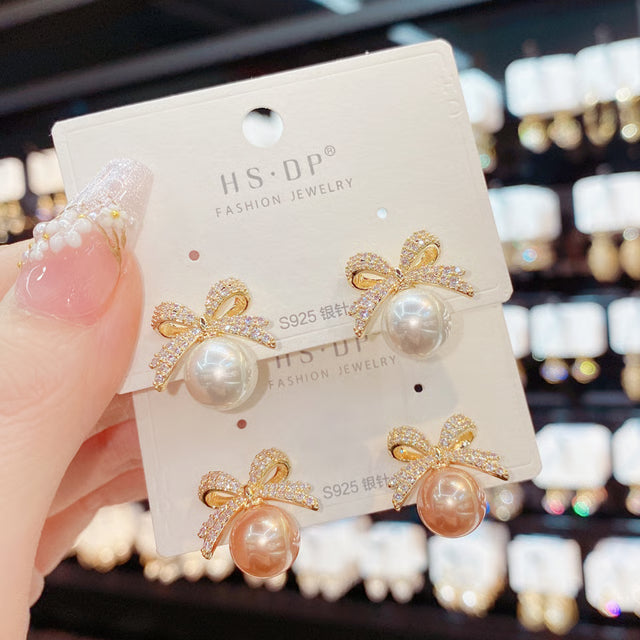 Rhinestone Bow Pearl Stud Earrings – Elegant Fashion Jewelry for Women