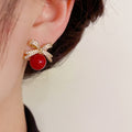 Rhinestone Bow Pearl Stud Earrings – Elegant Fashion Jewelry for Women