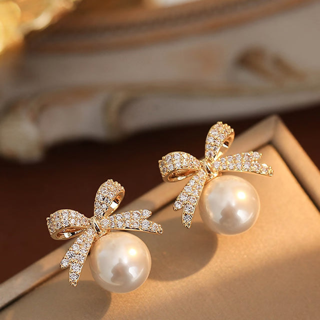 Rhinestone Bow Pearl Stud Earrings – Elegant Fashion Jewelry for Women