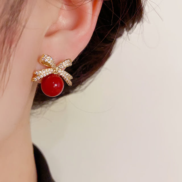 Rhinestone Bow Pearl Stud Earrings – Elegant Fashion Jewelry for Women